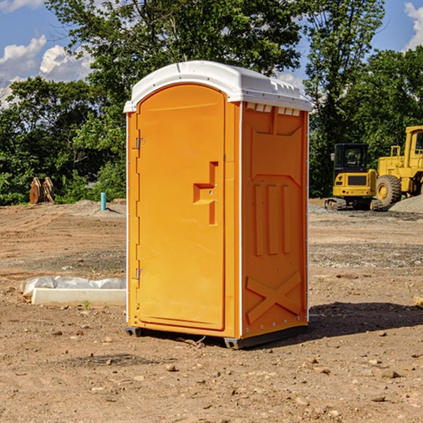 how often are the portable restrooms cleaned and serviced during a rental period in Lynn Center